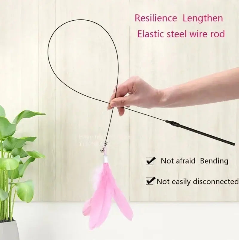 Cat Teaser Stick With Bell Extended Rod featuring a flexible steel wire and pink feather attachment. Ideal for interactive cat play and exercise.